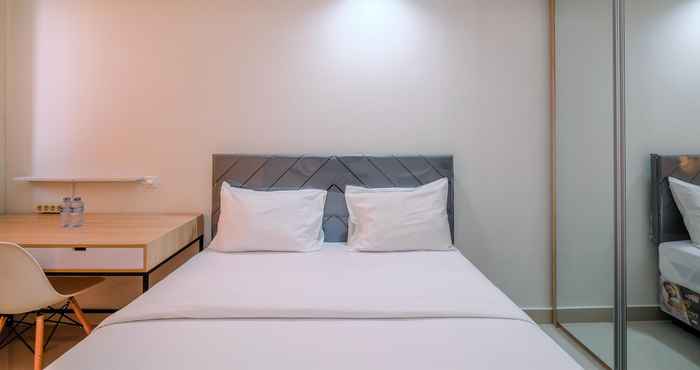 Bedroom Cozy and Simply Studio at Evenciio Margonda Apartment By Travelio