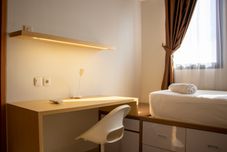 Common Space Classic and Modern 1BR at Evenciio Apartment By Travelio