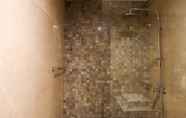 In-room Bathroom 7 3BR Spacious Apartment Veranda Residence at Puri By Travelio
