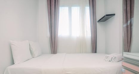 臥室 2 Minimalist and Warm 1BR at Signature Park Grande Apartment By Travelio