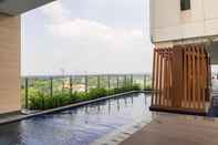 Swimming Pool Simply Look and Comfort Studio Room Apartment at B Residence By Travelio