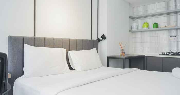 Bedroom Simply and Warm Studio Room at Urbantown Serpong Apartment By Travelio