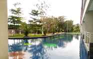 Swimming Pool 6 Comfort Stay and Homey Studio at Green Park Yogyakarta Apartment By Travelio