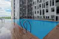 Swimming Pool Cozy Stay and Comfort 1BR at The Alton Apartment By Travelio