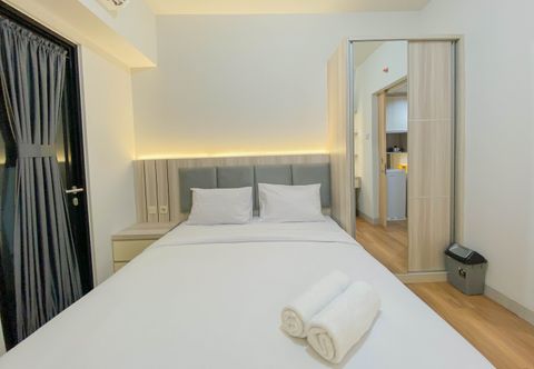 Bedroom Fully Furnished 1BR at The Alton Apartment By Travelio