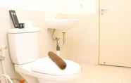 Toilet Kamar 7 Well Design and Comfort 2BR with Working Room at Meikarta Apartment By Travelio