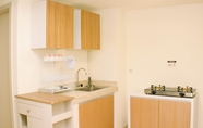 Common Space 6 Well Design and Comfort 2BR with Working Room at Meikarta Apartment By Travelio