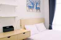 Bedroom Comfortable Design 1BR at Vasanta Innopark Apartment By Travelio