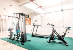 Fitness Center 7 Modern Studio Room at Taman Melati Jatinangor Apartment By Travelio