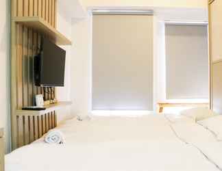 Kamar Tidur 2 Cozy Living Studio at High Floor Tokyo Riverside PIK 2 Apartment By Travelio