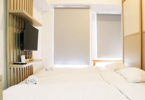 Bedroom Cozy Living Studio at High Floor Tokyo Riverside PIK 2 Apartment By Travelio
