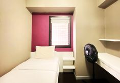 Bedroom 2 Homey 2BR Apartment at Gateway Ahmad Yani Cicadas By Travelio
