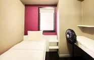 Bedroom 2 Homey 2BR Apartment at Gateway Ahmad Yani Cicadas By Travelio