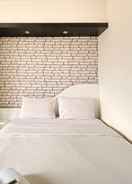 BEDROOM Homey 2BR Apartment at Gateway Ahmad Yani Cicadas By Travelio