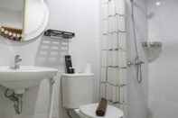 Toilet Kamar Comfy and Best Deal Studio at Patraland Urbano Apartment By Travelio