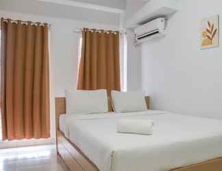 Kamar Tidur 2 Comfy and Best Deal Studio at Patraland Urbano Apartment By Travelio