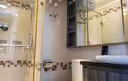 In-room Bathroom 6 Cozy Living and Nice 2BR Apartment at Green Bay Pluit By Travelio