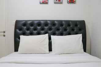 Kamar Tidur 4 Homey and Tranquil Designed 2BR at Springlake Summarecon Bekasi Apartment By Travelio