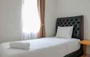Bedroom 2 Homey and Tranquil Designed 2BR at Springlake Summarecon Bekasi Apartment By Travelio