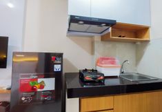 Common Space 4 Minimalist Studio at Serpong Garden Apartment By Travelio