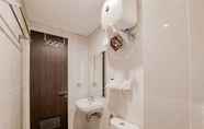 In-room Bathroom 5 Cozy Style and Comfort 1BR at Serpong Garden Apartment By Travelio