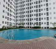 Swimming Pool 6 Cozy Style and Comfort 1BR at Serpong Garden Apartment By Travelio