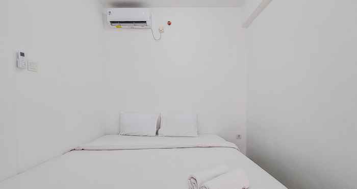 Kamar Tidur Cozy Style and Comfort 1BR at Serpong Garden Apartment By Travelio