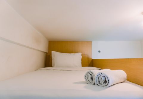 Bedroom Modern and Homey Studio Apartment at Akasa Pure Living BSD By Travelio