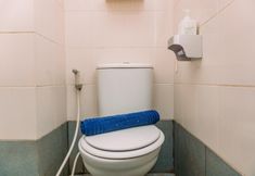 In-room Bathroom 5 Modern and Homey Studio Apartment at Akasa Pure Living BSD By Travelio