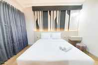 Bedroom Studio New at Patraland Amarta Apartment By Travelio