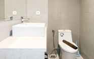 In-room Bathroom 5 Studio New at Patraland Amarta Apartment By Travelio