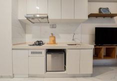 Common Space 4 Elegant and Well Designed Studio at Sky House BSD Apartment By Travelio