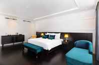 Kamar Tidur The Almin Hotel