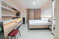 Common Space Comfortable and Elegant Studio Patraland Amarta Apartment By Travelio