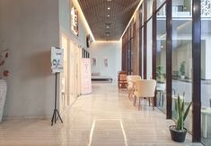 Lobby 7 Comfortable and Elegant Studio Patraland Amarta Apartment By Travelio