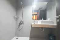 In-room Bathroom Comfortable and Elegant Studio Patraland Amarta Apartment By Travelio
