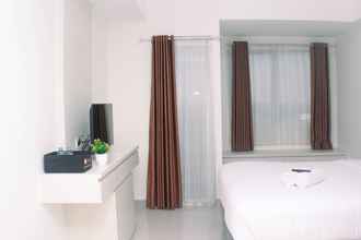 Common Space 4 Nice Studio Room at Oasis Cikarang Apartment By Travelio