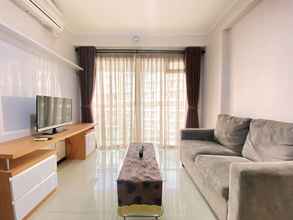 Common Space 4 Cozy Living 2BR Apartment at Gateway Pasteur By Travelio