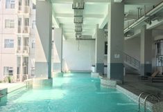Swimming Pool 6 Comfy Studio Apartment at Harvard Jatinangor By Travelio