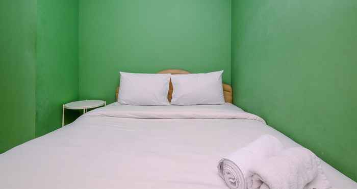 Bilik Tidur Cozy Style and Minimalist 2BR at Green Pramuka City Apartment By Travelio