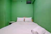 Bilik Tidur Cozy Style and Minimalist 2BR at Green Pramuka City Apartment By Travelio