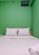 BEDROOM Cozy Style and Minimalist 2BR at Green Pramuka City Apartment By Travelio