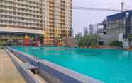 Swimming Pool 6 Studio Cozy at Teluk Intan Apartment By Travelio