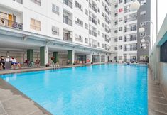 スイミングプール 5 Studio Room Comfort at Mekarwangi Square Cibaduyut Apartment By Travelio