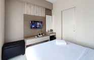Common Space 2 Modern and Comfortable 1BR without Living Room at Amartha View Apartment By Travelio