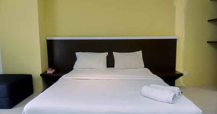 Kamar Tidur Comfort and Nice 1BR at Tamansari Semanggi Apartment By Travelio