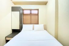 Bedroom 2BR Modern Designed at Suites @Metro Apartment By Travelio