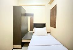 Bedroom 2 2BR Modern Designed at Suites @Metro Apartment By Travelio