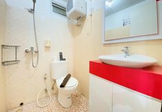 In-room Bathroom 6 2BR Modern Designed at Suites @Metro Apartment By Travelio