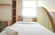 Bedroom 3 Comfy and Modern 3BR at Transpark Cibubur Apartment By Travelio